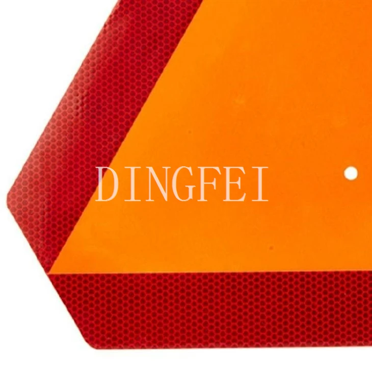 Orange Triangle Sign On Vehicle